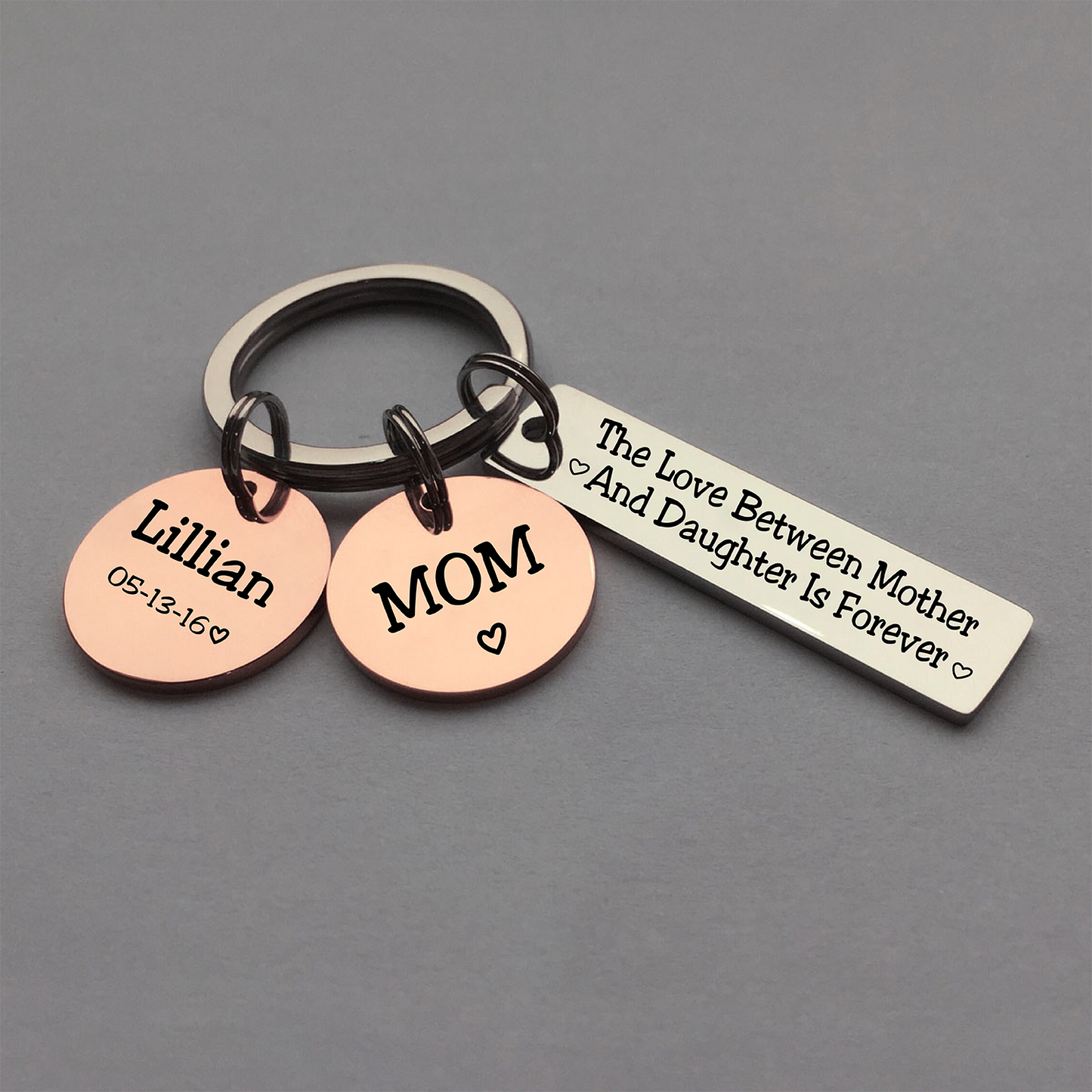 The love between Mother and Daughter is forever - personalized keychain